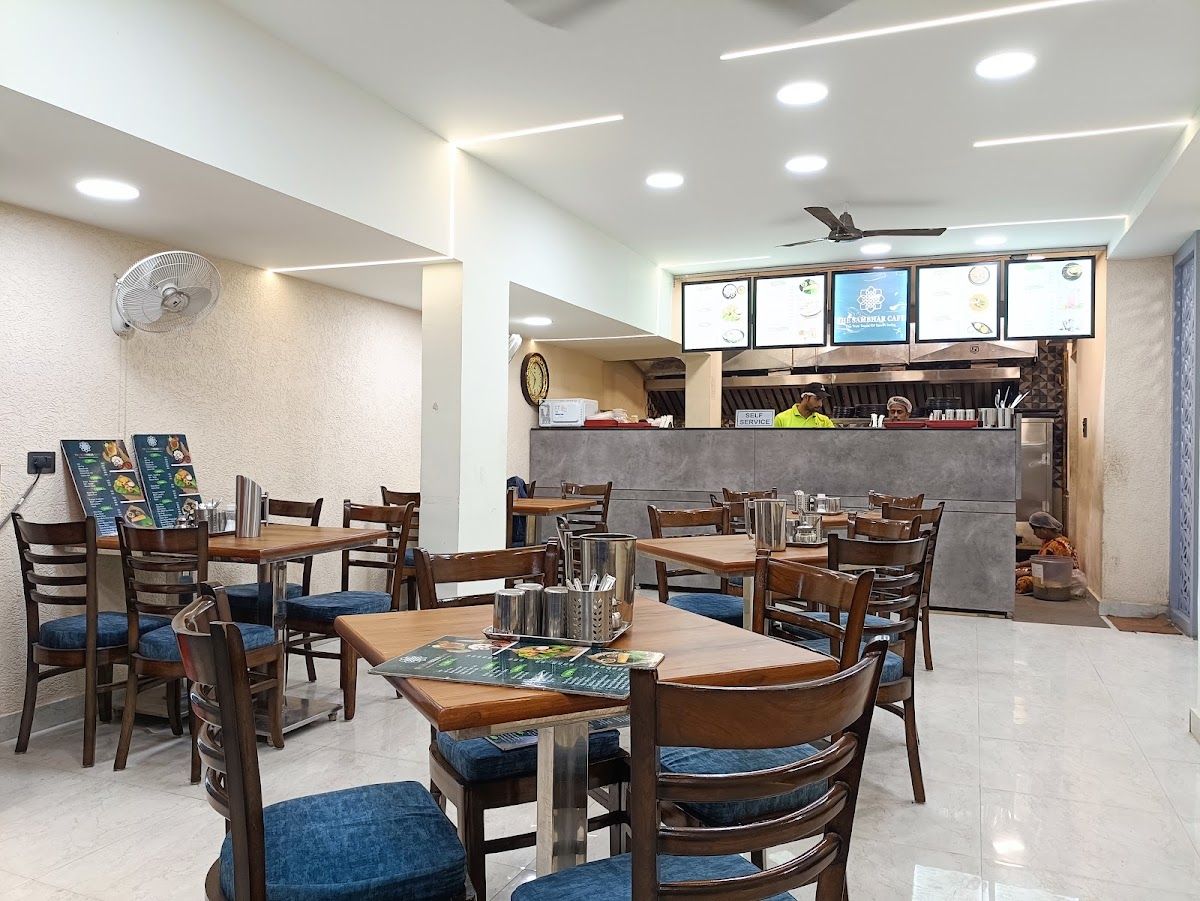 Open counter and seating at The Sambhar Cafe